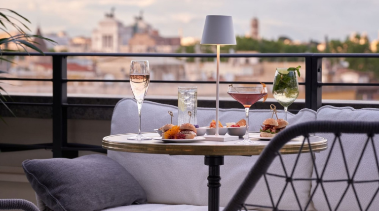 2 Rome Expats International social exchange Tuesday April 15 2025 Rooftop of UNAHOTELS Trastevere Roma 768x429