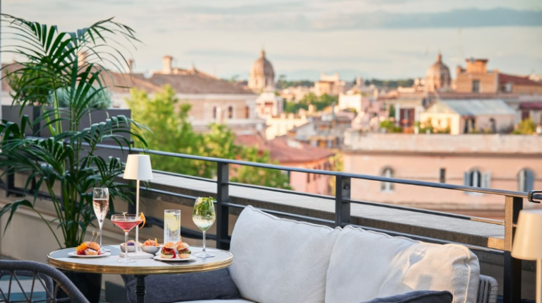 3 Rome Expats International social exchange Tuesday April 15 2025 Rooftop of UNAHOTELS Trastevere Roma 768x429